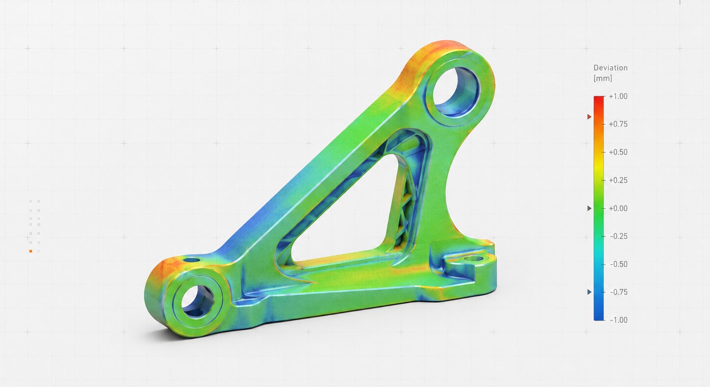 Color-mapped deviation of the CAD model against the scan, with scale bar